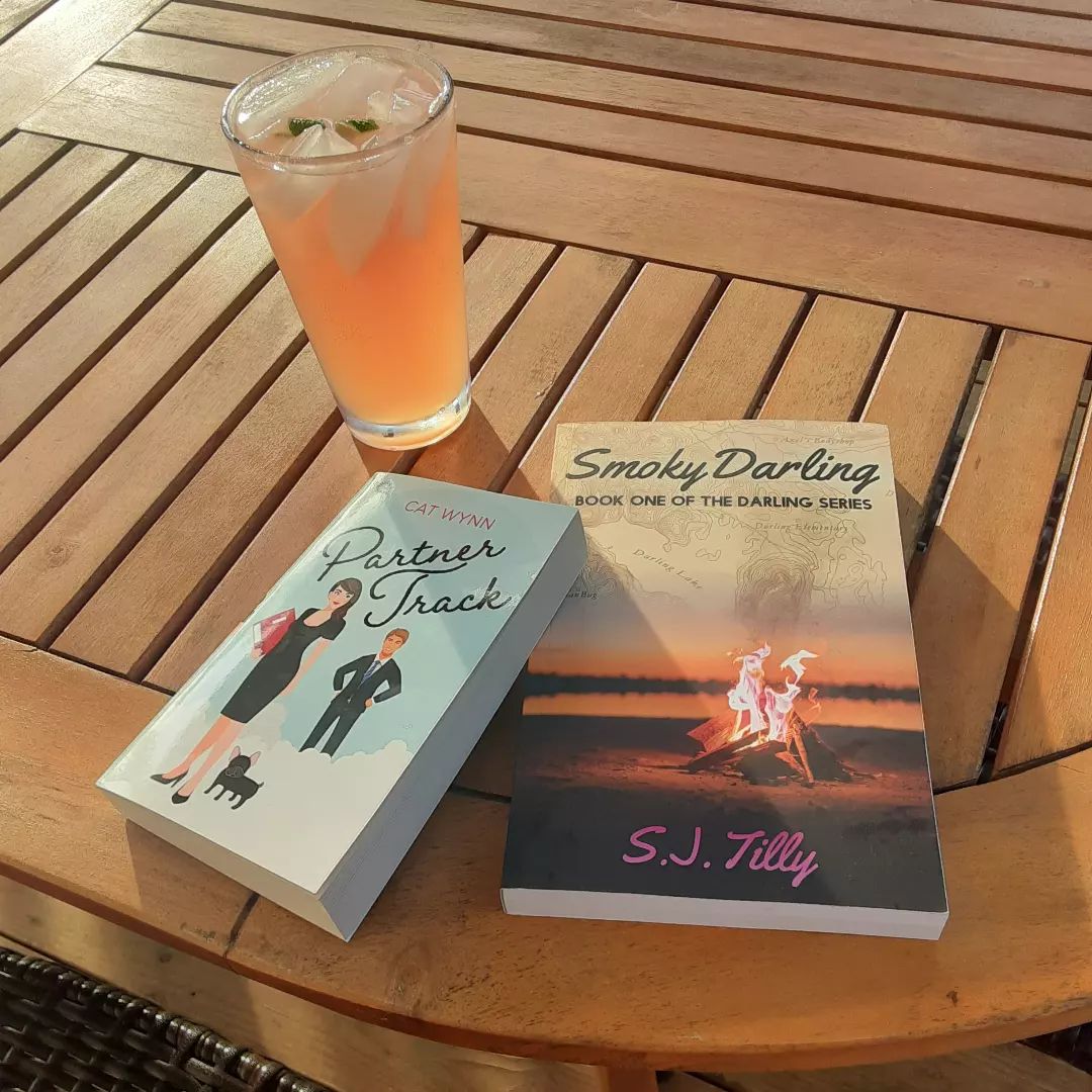 @sjtillyauthor is bartending at our retreat weekend. Getting lots of words in on Justin's book and maybe even some steam... also gonna get the pretties in the photo signed before I leave here.